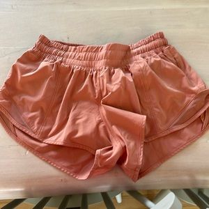 Lululemon Size 4 Hotty Hot shorts. Coral Kiss. Low rise and 2.5”
